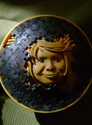 Breaktrough, Durchbruch, puzzle, face, Cornel, Schneider, Boxwood, Buchsbaum,  jpeg, jpg, scuplture, Schnitzerei, Carving, netsuke, manju