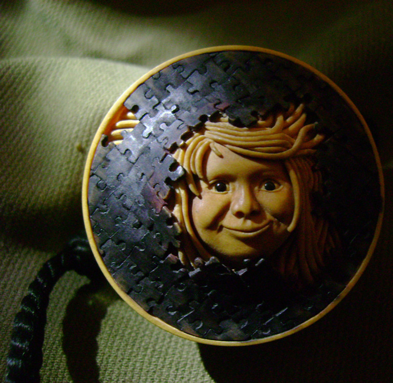 Breaktrough, Durchbruch, puzzle, face, Cornel, Schneider, Boxwood, Buchsbaum,  jpeg, jpg, scuplture, Schnitzerei, Carving, netsuke, manju